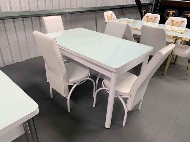 Brand New Dining table 6 chairs and 4 chairs set. 
